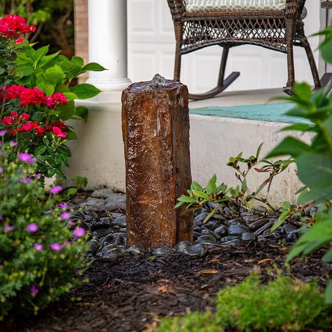 basalt faux column water fountain with rocks