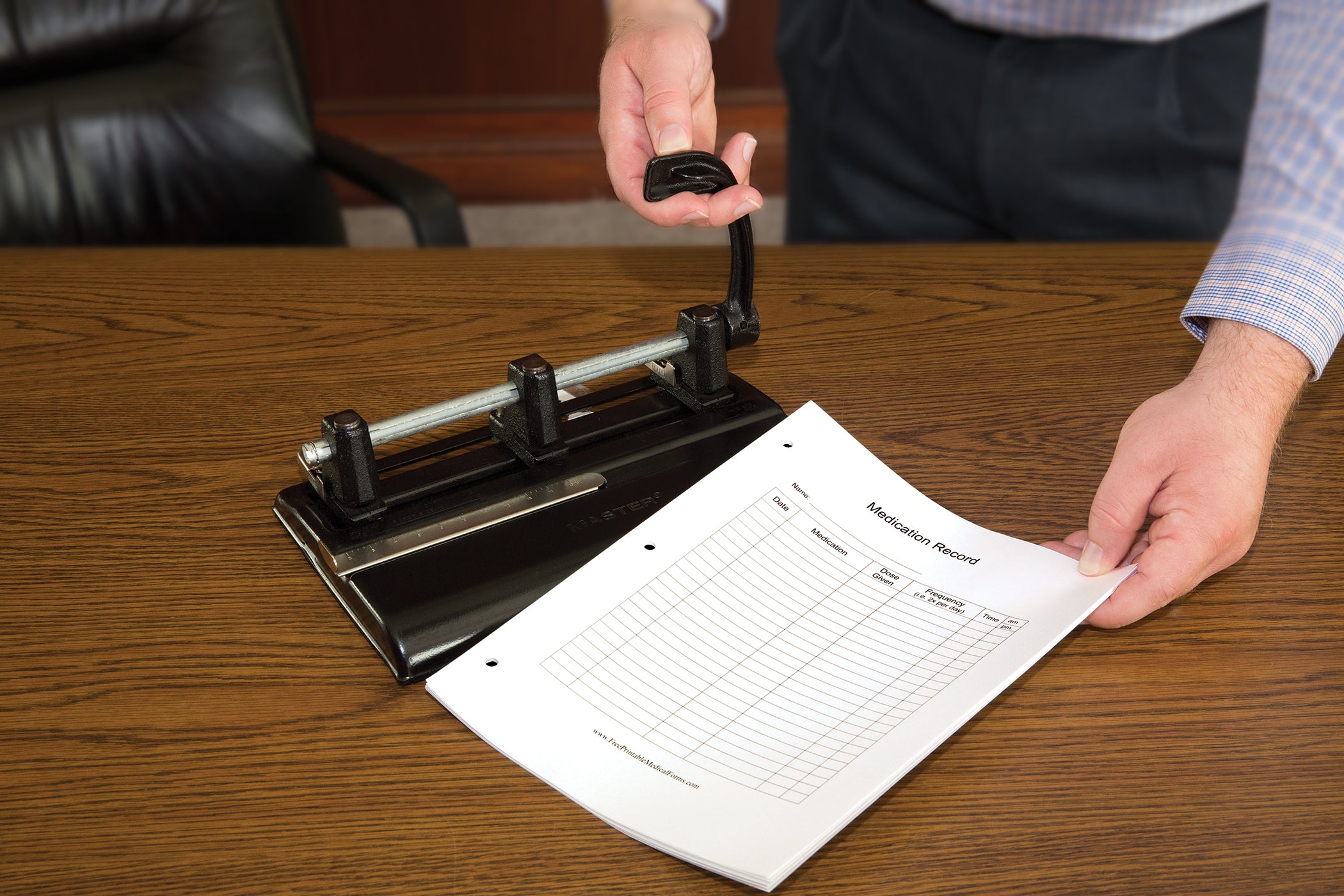 40-Sheet High-Capacity Lever Action Adjustable Two- to Seven-Hole Punch by  Master® MAT1325B