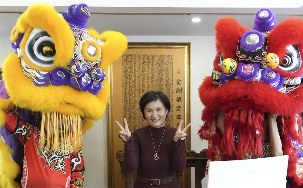 Mary smiling with staff