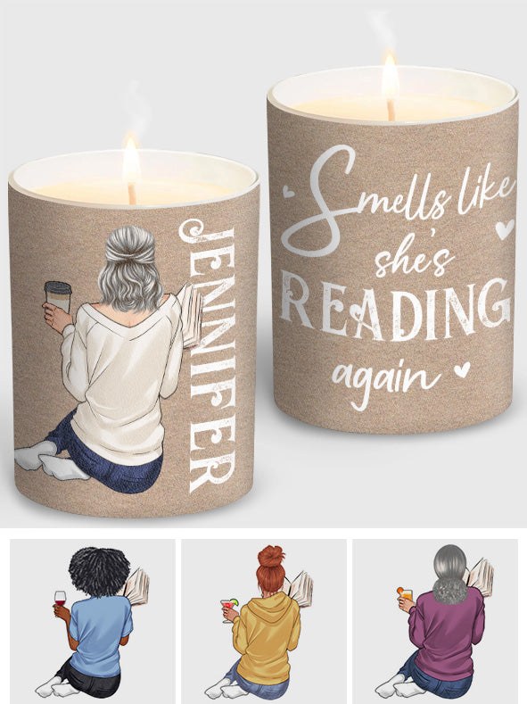 Reading, books in stacks and open. Bookmarks and glasses, candle