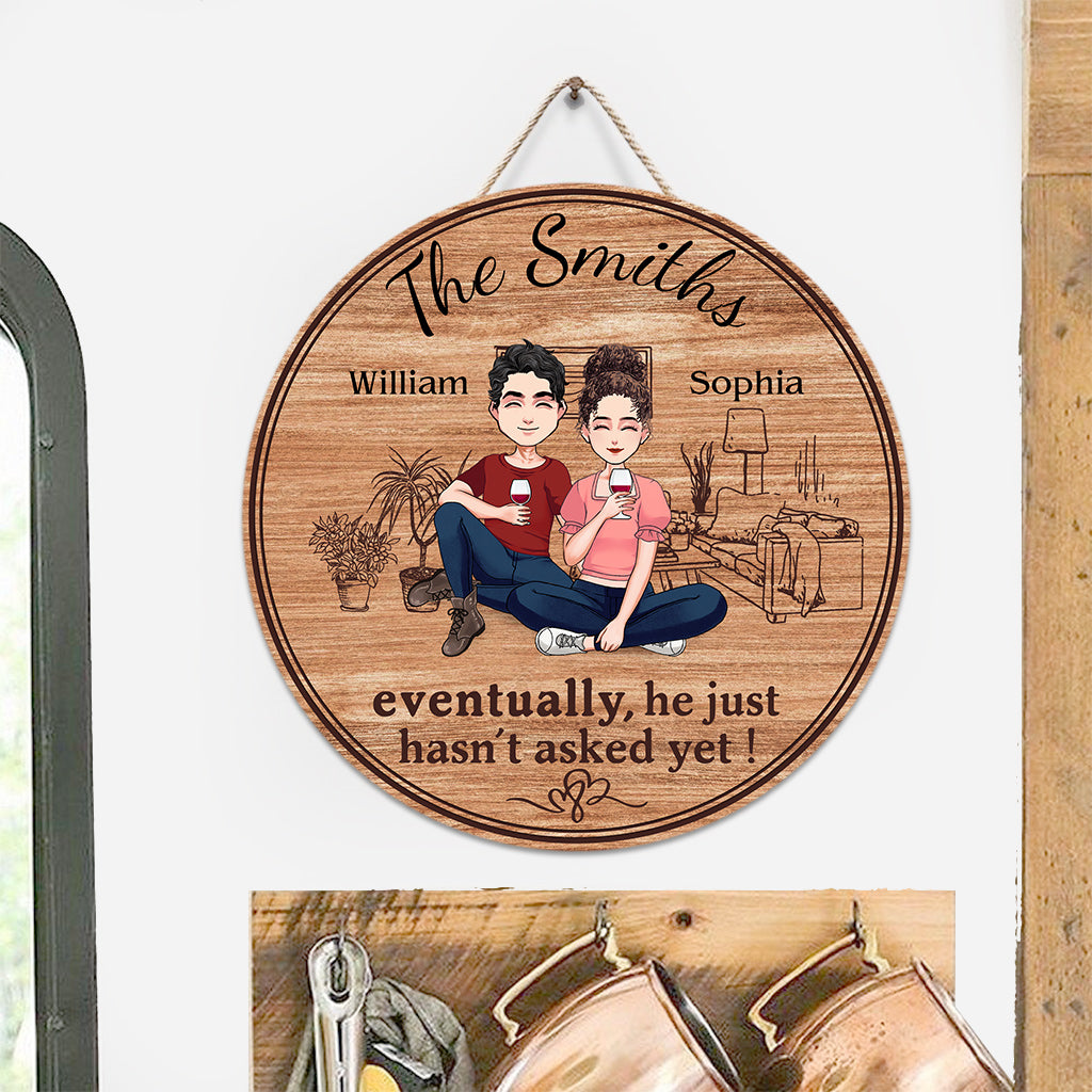 Eventually He Just Hasn't Asked Yet - Personalized Husband And Wife Round Wood Sign
