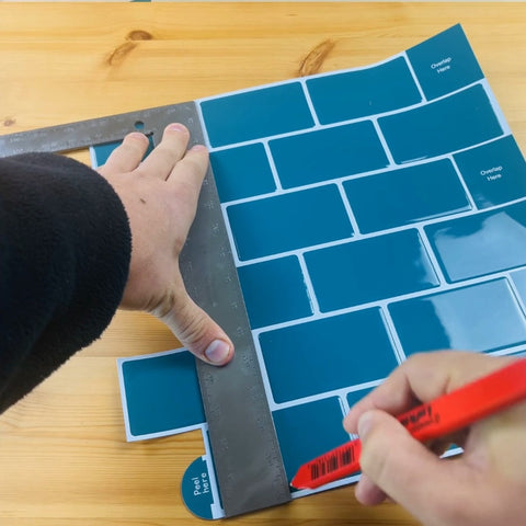 cutting first stick on tile