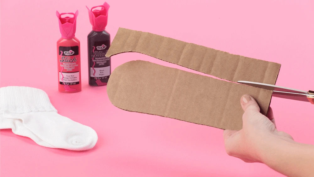 How To Paint Grip Socks with Dimensional Paint - cut cardboard to fit socks