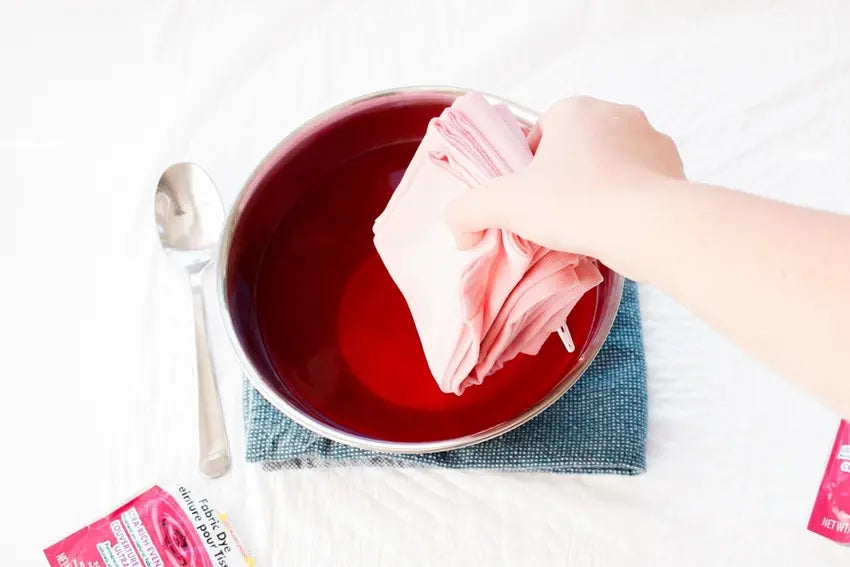 Dip each side in dye bath