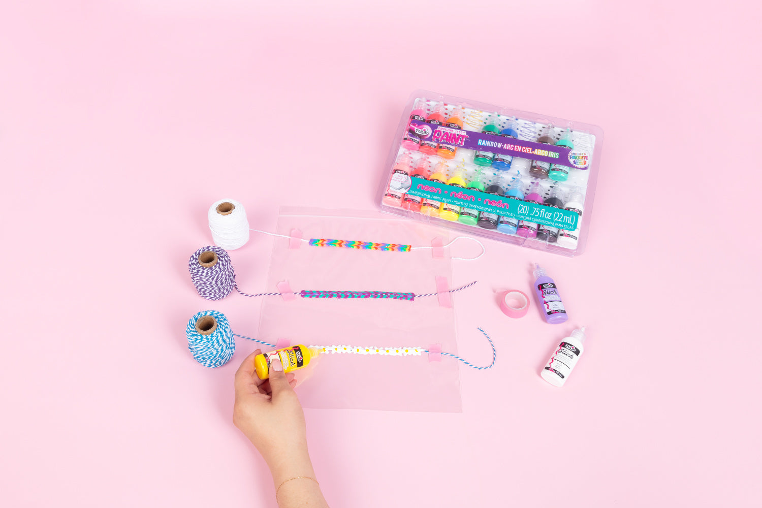 Apply Puff Paint to twine to make DIY friendship bracelets