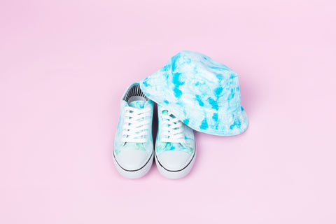 Gender neutral tie-dye shoes and bucket hat