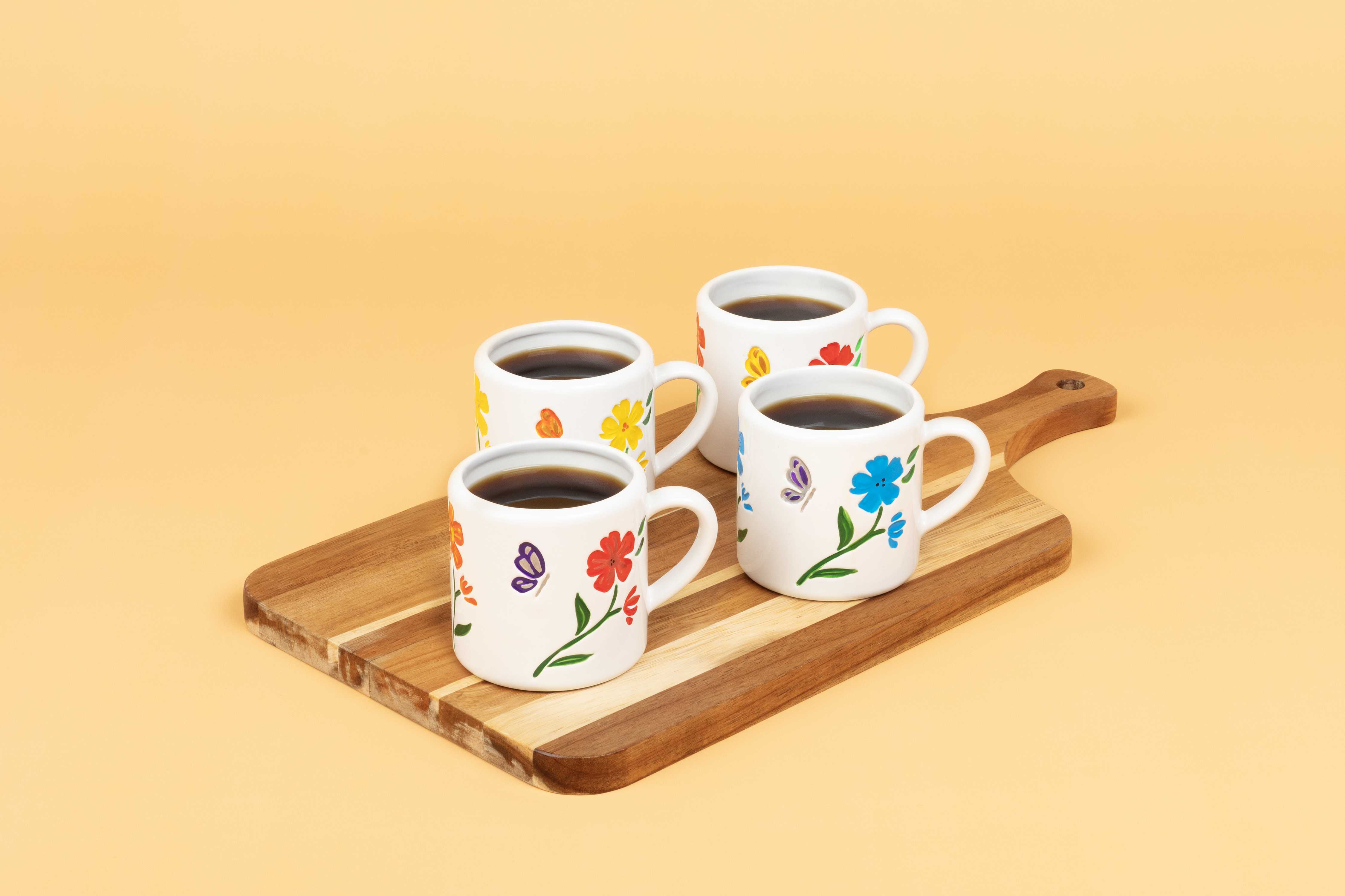 Bake and enjoy your floral painted mugs