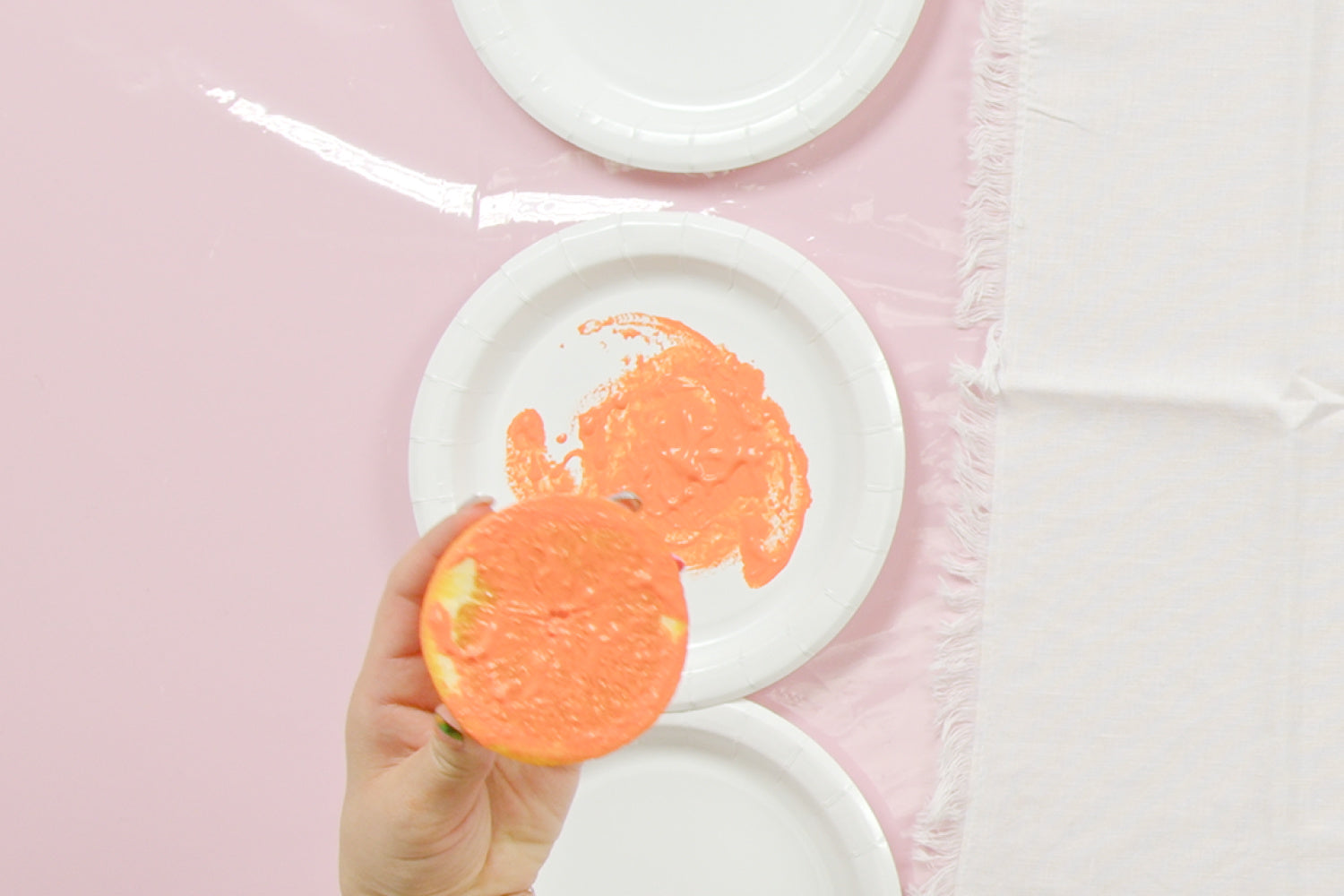 Dip fruit into paint cut side down