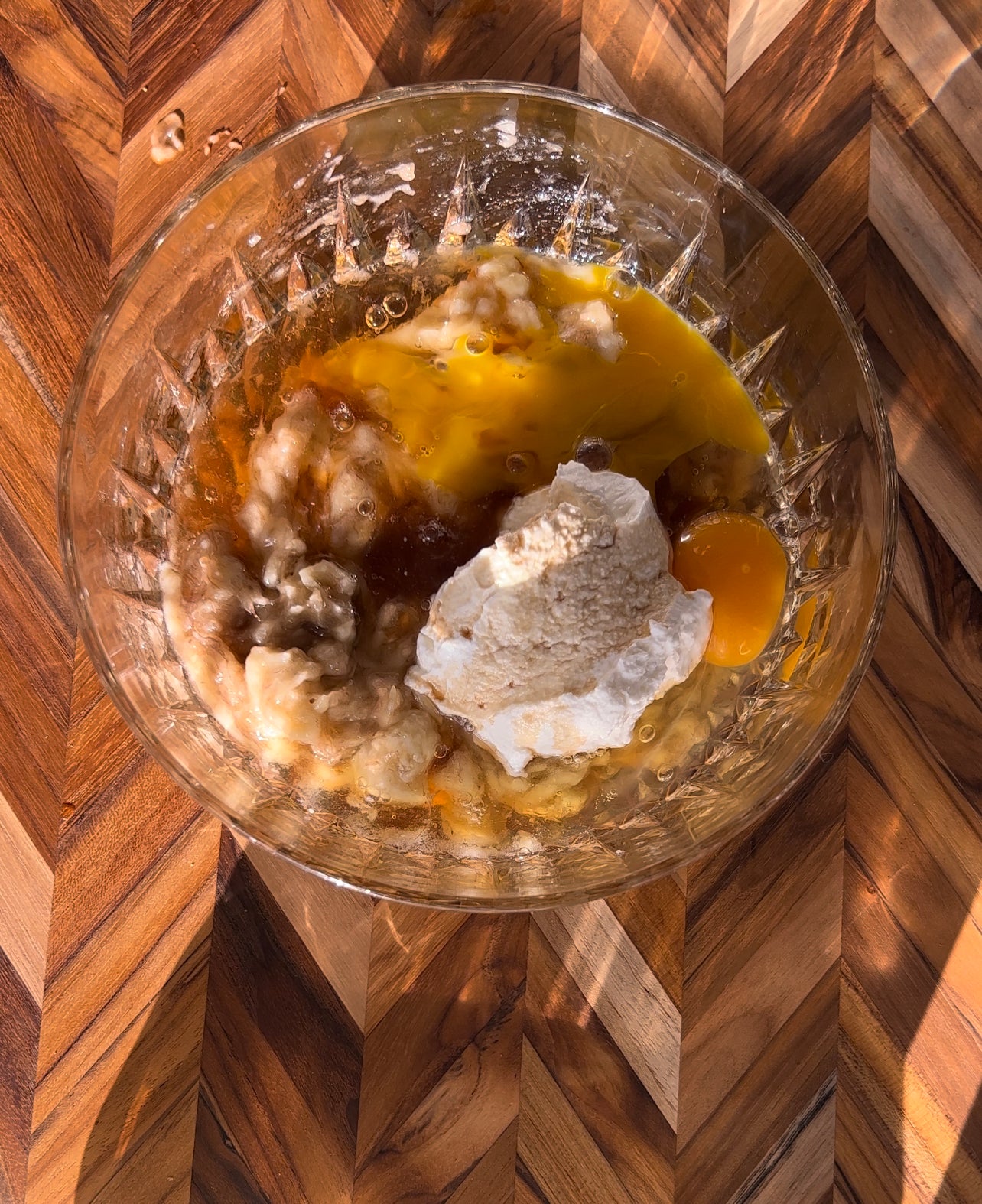 gut healthy banana bread, picture of combining wet ingredients for the batter before baking