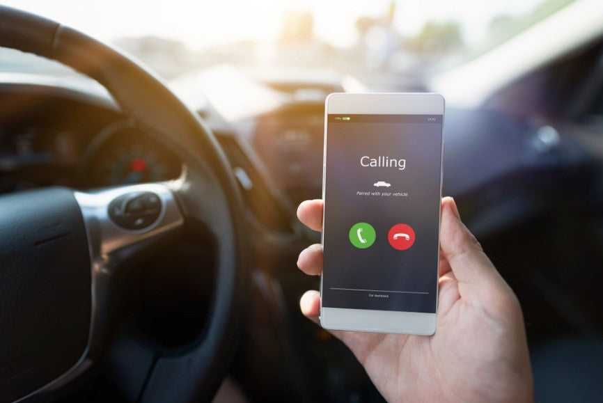 Utilisation du support de téléphone de voiture pour une communication mains libres