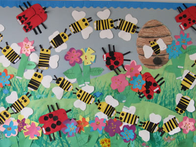 Bugs and Flowers bulletin board from HeidiSongs, heidisongs, kindergarten, crafts, spring ideas