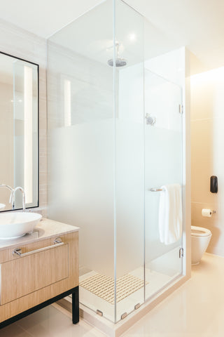 Rectangular shower enclosure with Mixed Clear & frosted glass. Clear glass for top and bottom of the shower enclosure, and Frosted for the middle