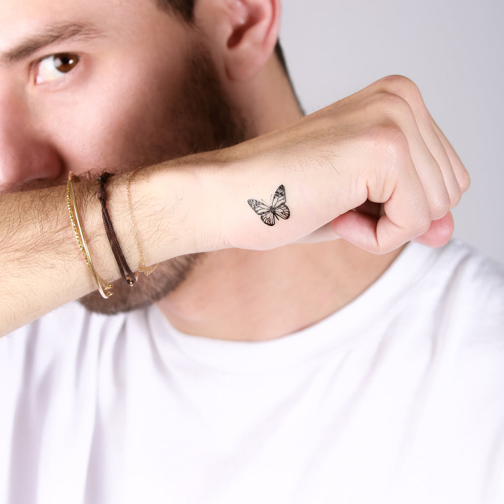 Signification tatouage papillon dans le poignet pour homme