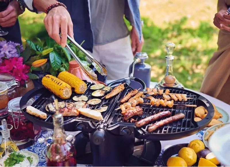 cooking food with the NomadIQ Gas BBQ