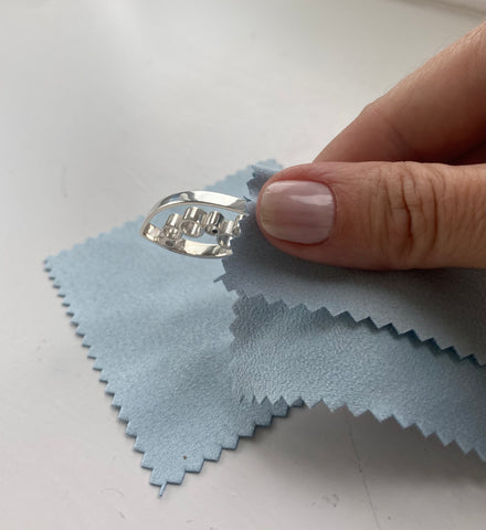 Look after your silver jewellery by keeping it clean and polishing it with a cloth.