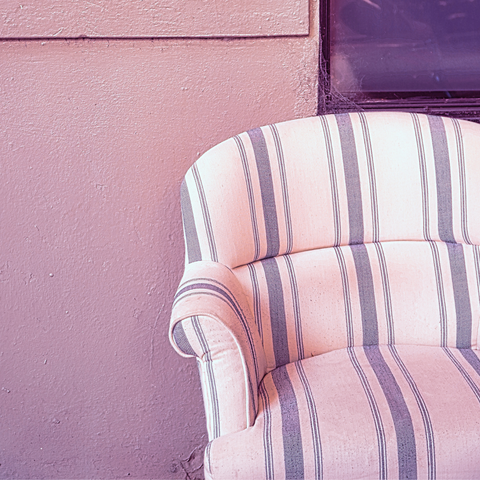 Armchair in striped fabric