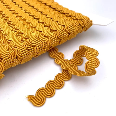 Gold coloured gimp braid trim