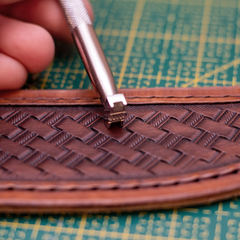 Stamping veg tanned leather with metal stamps