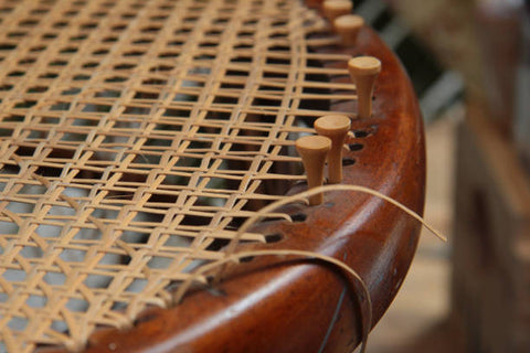 Hand woven chair seat using rattan cane