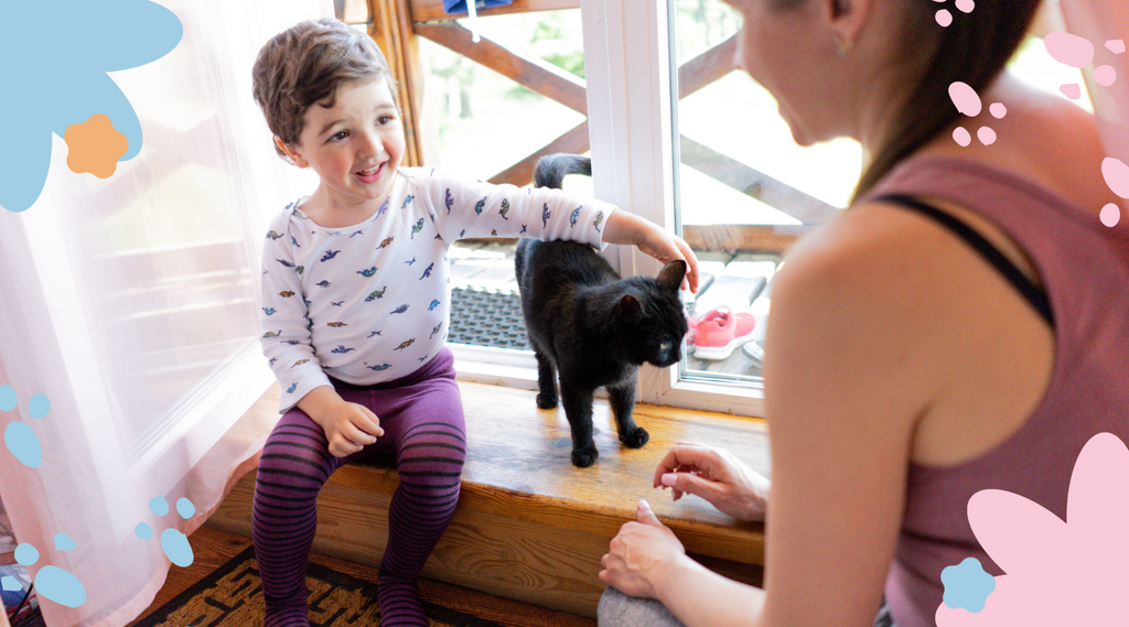 A child, parent, and their furry friend, all smiles