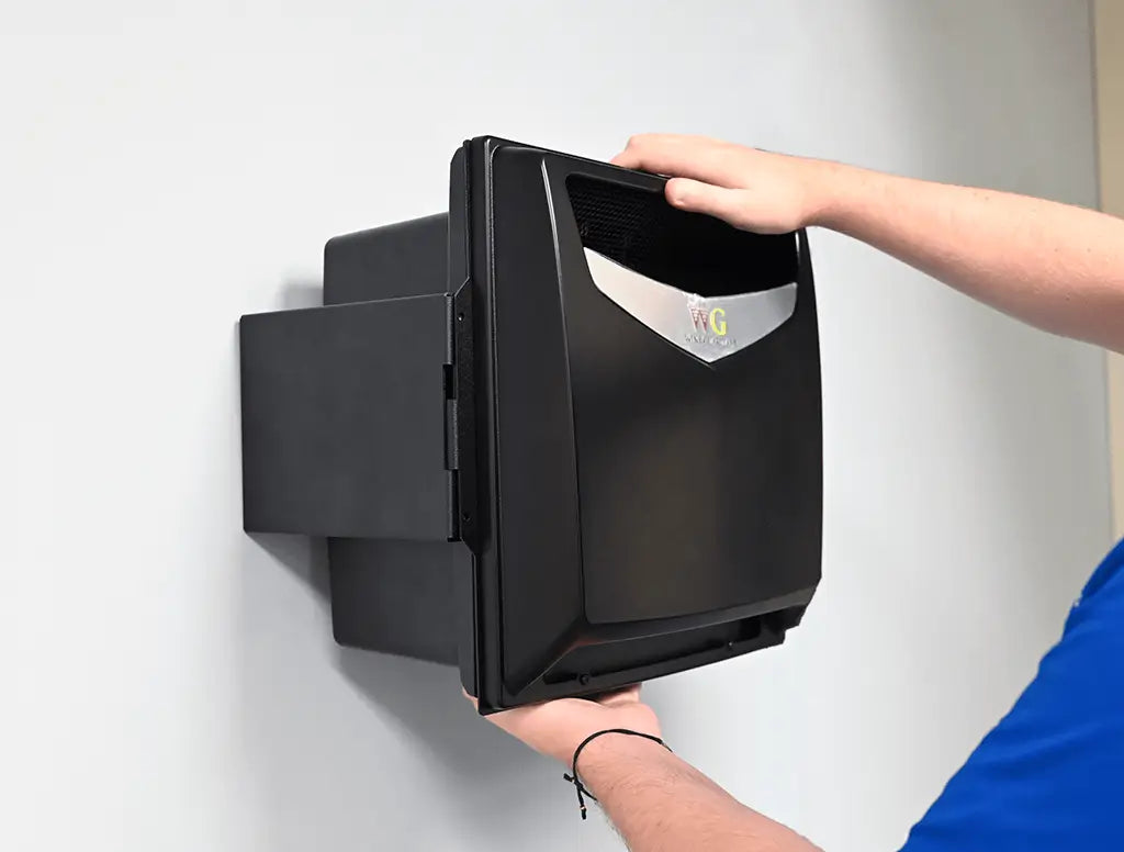 Installing a Wine Guardian ductless split system on a wall | Wine Guardian Dealer