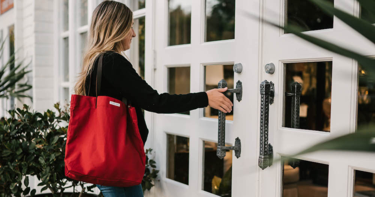 Woman carrying cotton tote bag