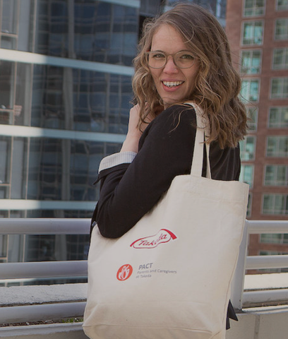 employee of Takeda with customized MADE FREE tote