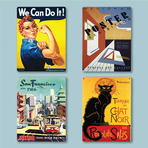 Four magnetic wall art boards with vintage posters printed on them