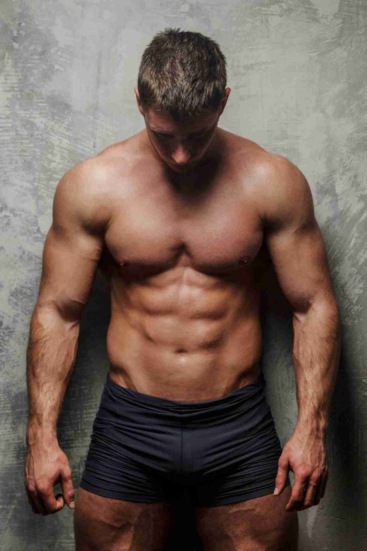 muscle man with underwear look down