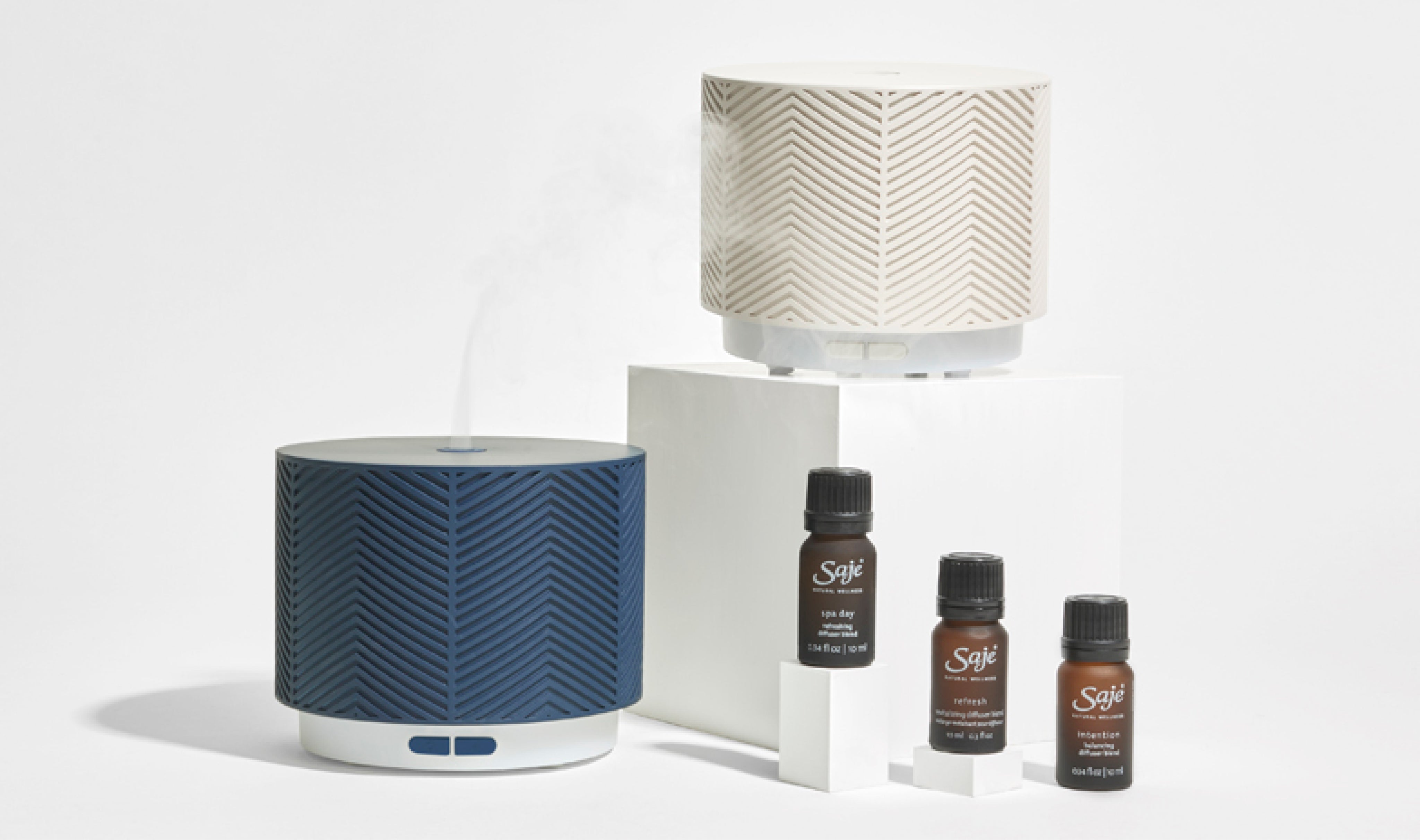 Aroma Nook diffusers and diffuser blends against a white background
