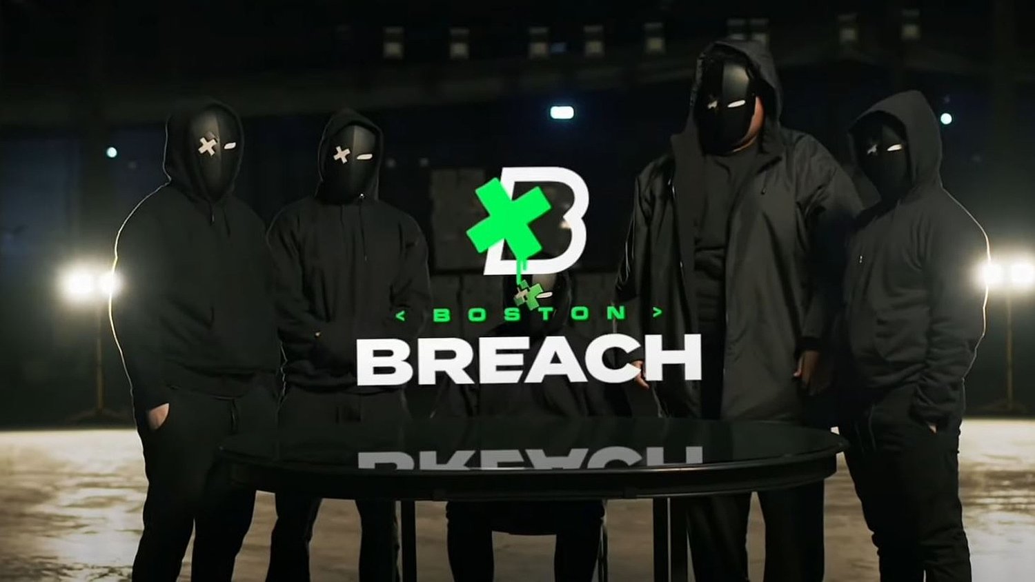 Boston Breach roster in Breach Mask behind Boston Breach logo