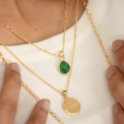 emerald necklace in gold on gold chain