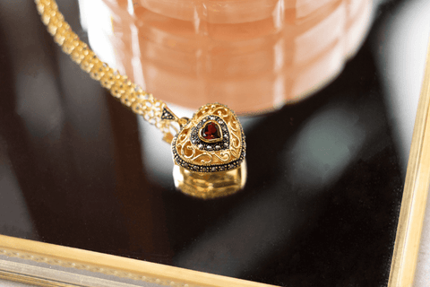 jewellery trends, gold garnet locket necklace