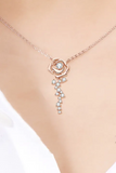 rose gold plated sterling and moissanite necklace