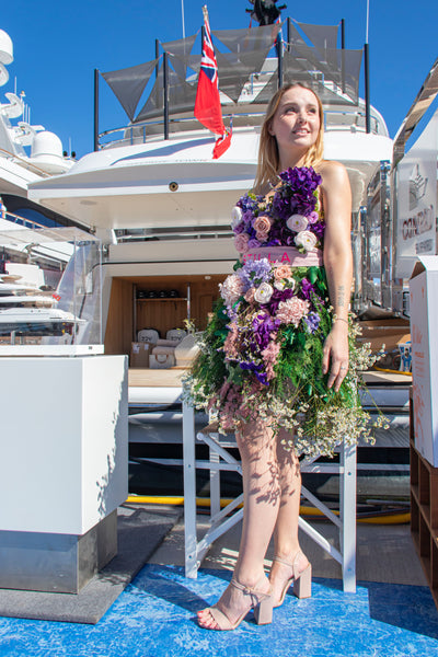 STILLA's Flower dress in front of Motor Yacht Ace