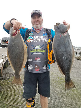 Fisher holding up halibut