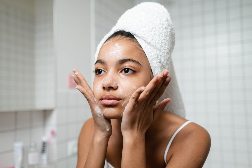 A woman washing her face