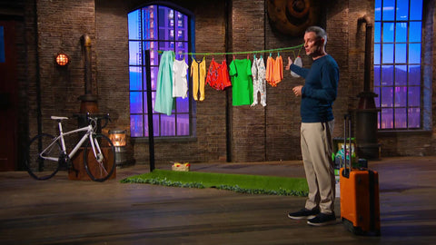 Picture of Colin O Brien from Peggy Rain washing line Pitching his clothesline and Rollaer Roller case suitcase on BBC 1 Dragons, Den