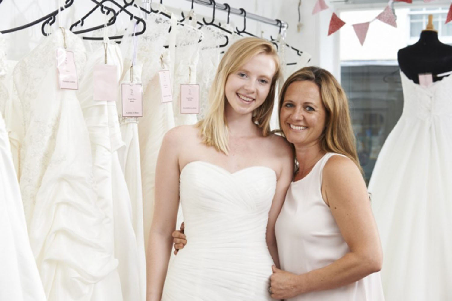 daughter and mum wedding dress shopping