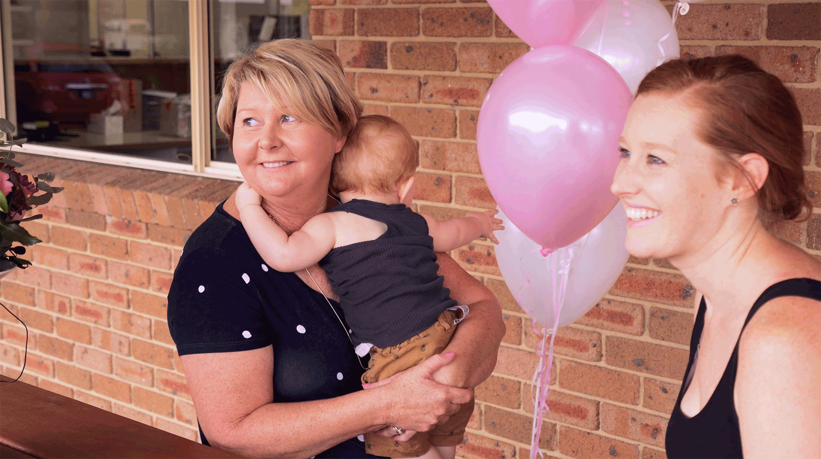 Mum with grandson and daughter