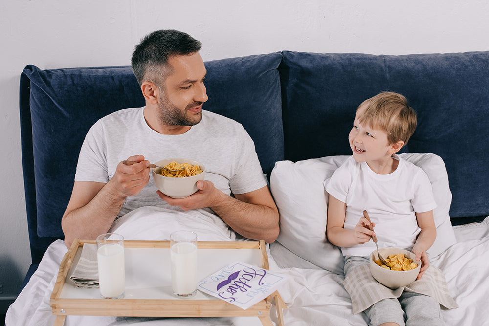 dad son breakfast in bed