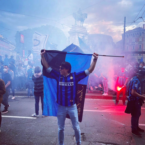 Inter Fan with flare outside San Siro