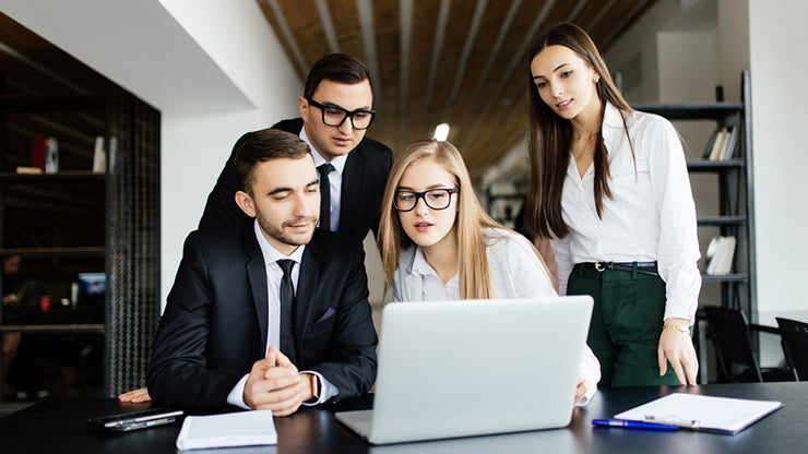 business people reviewing information computer