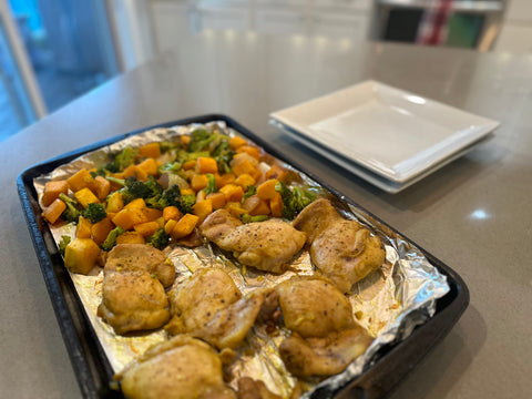 Curried chicken and vegetables on a sheet pan