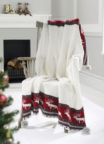 Knitted Christmas blanket on a chair