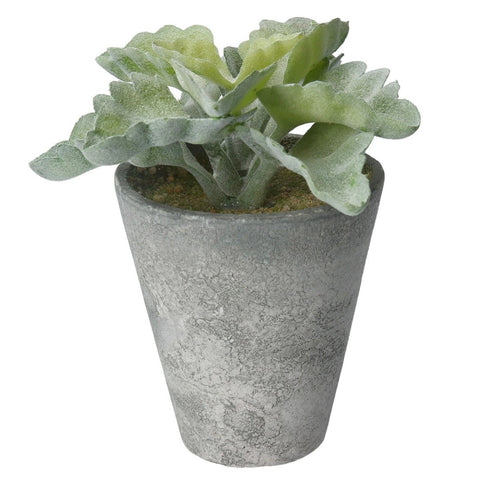 Green faux plant in a grey pot