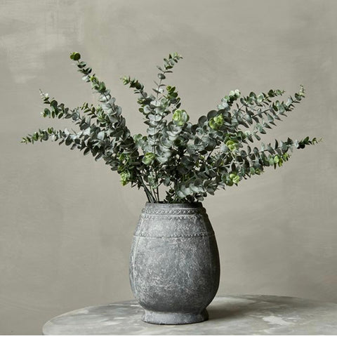 Faux eucalyptus in a vessel