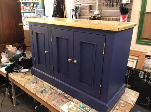 After, painted and upcycled kitchen cabinet into a home bar
