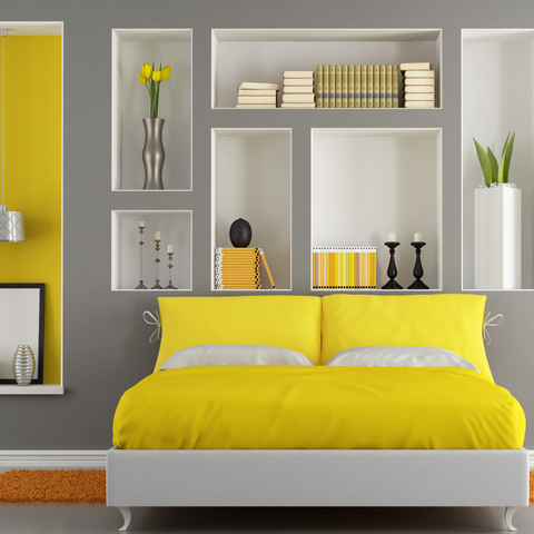 Yellow colour pop in grey bedroom