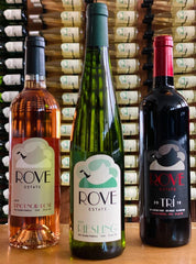 Three bottles of Rove Estate's wines with the Pinot Noir Rosé on the left, the Riesling in the middle, and the Trí on the right. 